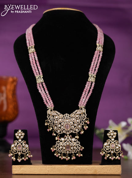 Beaded triple layer baby pink necklace with kundan & cz stones and pearl & beads hangings