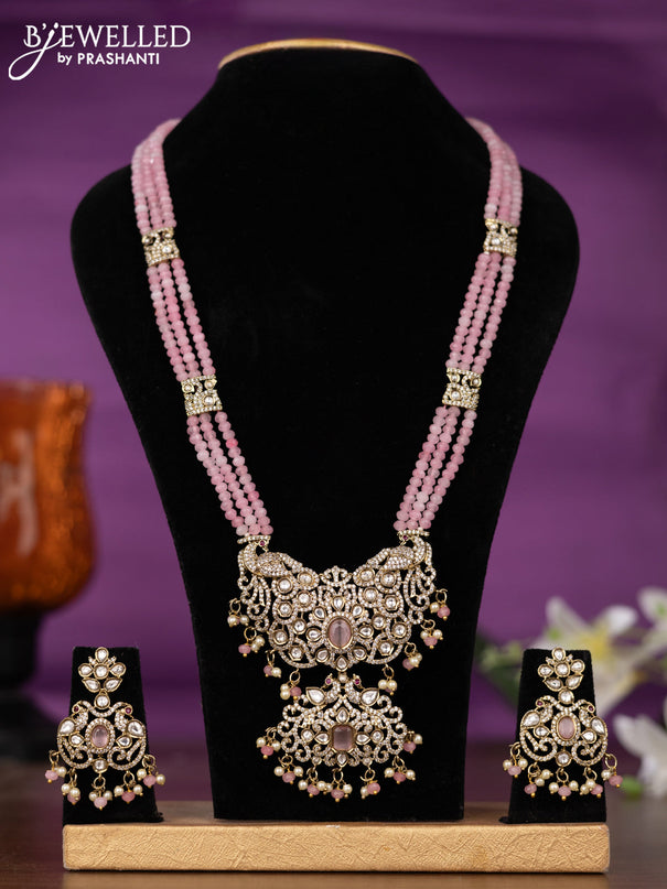 Beaded triple layer baby pink necklace with kundan & cz stones and pearl & beads hangings