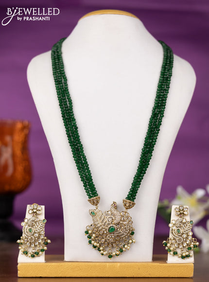 Beaded triple layer green necklace peacock design with emerald & cz stones and pearl & beads hangings