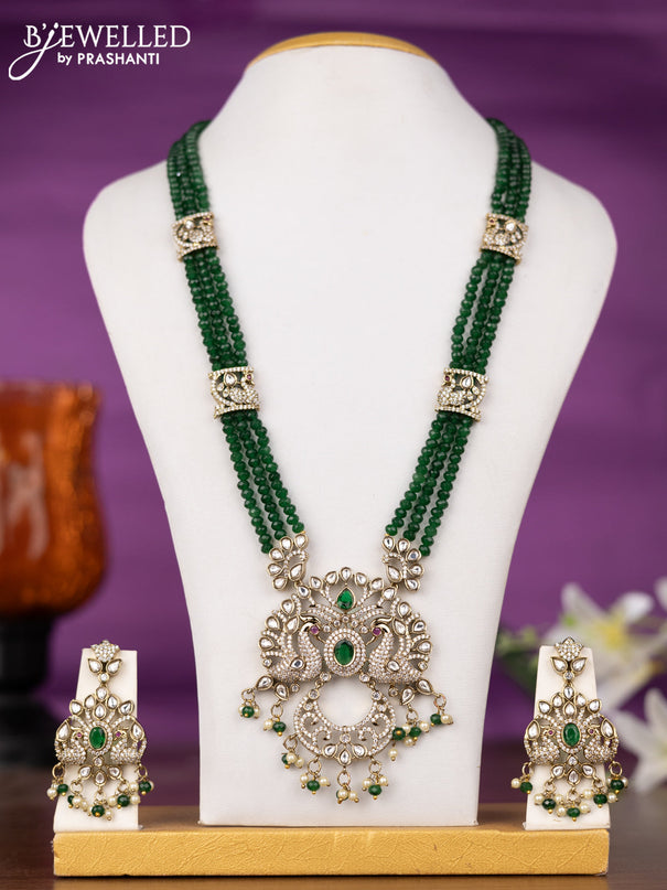 Beaded triple layer green necklace peacock design with kundan & cz stones and pearl & beads hangings