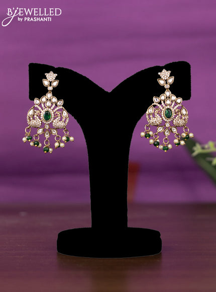 Beaded triple layer green necklace peacock design with kundan & cz stones and pearl & beads hangings