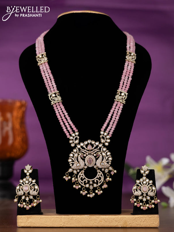 Beaded triple layer baby pink necklace peacock design with kundan & cz stones and pearl & beads hangings