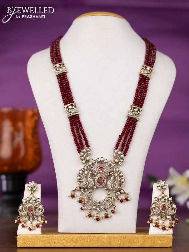 Beaded triple layer maroon necklace peacock design with kundan & cz stones and pearl & beads hangings