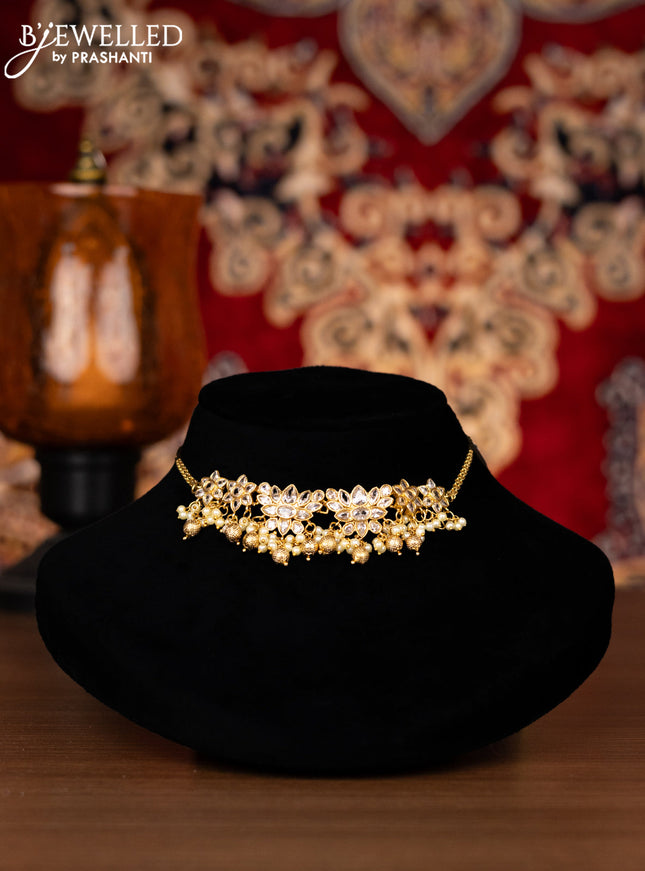 Antique choker lotus design with cz stones and pearl & golden beads hangings