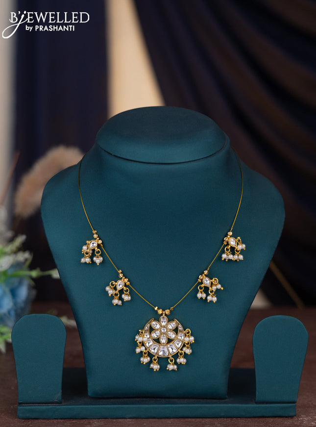 Invisible chain with kundan stones and pearl hangings without earring