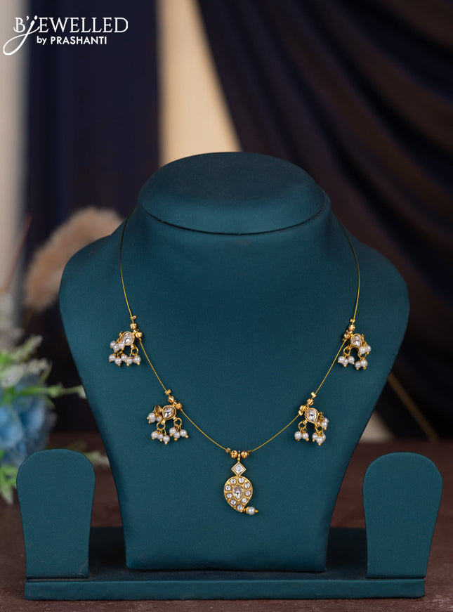 Invisible chain maanga pattern with kundan stones and pearl hangings without earring