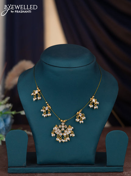 Invisible chain with kundan stones and pearl hangings without earring