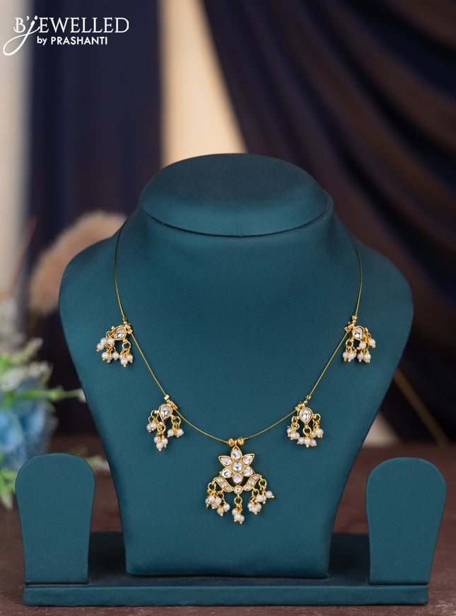 Invisible chain floral design with jadau kundan stones and pearl hangings without earring