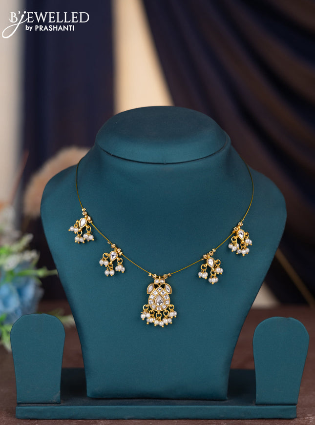 Invisible chain with kundan stones and pearl hangings without earring