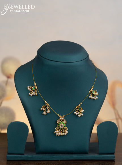Invisible chain with green jadau kundan stones and pearl hangings without earrings