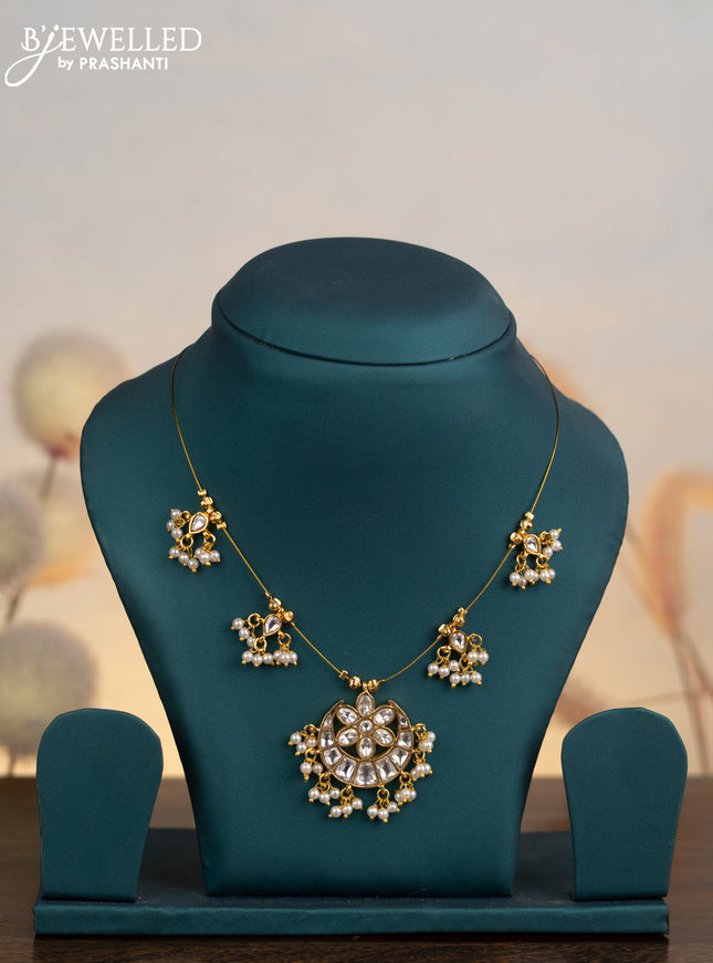 Invisible chain chandbali design with kundan stones and pearl hangings without earrings