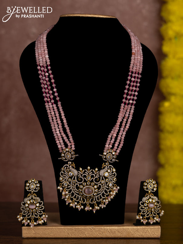Beaded multilayer baby pink necklace with cz stones and pearl & beads hangings in victorian finish
