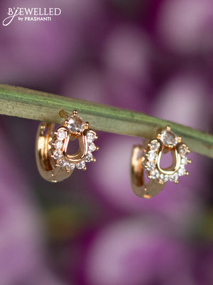 Rose gold hanging type earrings with cz stones