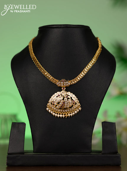 Attigai necklace with ruby & cz stones and hangings without earrings in gold finish