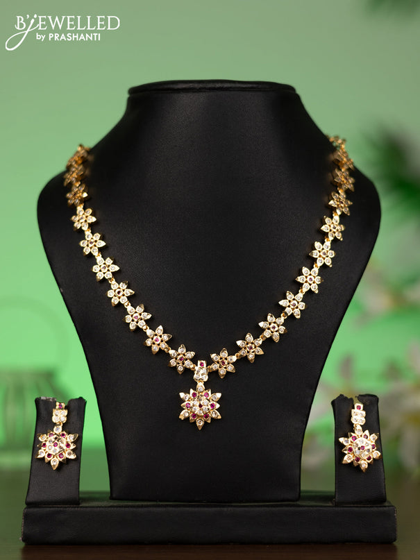 Attigai necklace floral design with ruby and cz stones in gold finish
