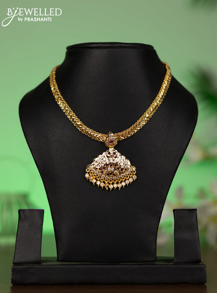 Attigai necklace with ruby & cz stones and hangings without earrings in gold finish