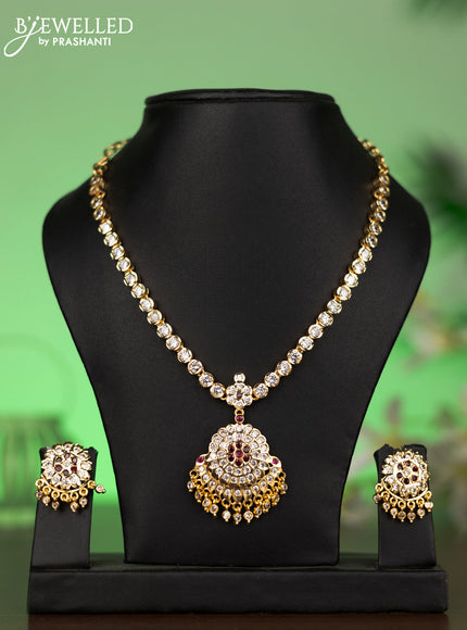Attigai necklace with ruby & cz stones and hangings in gold finish