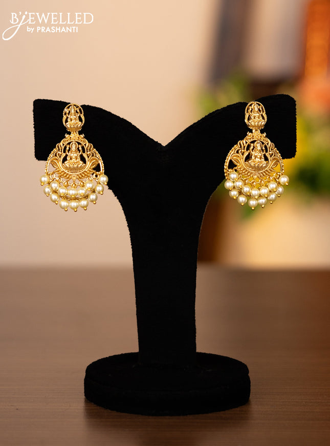Pearl necklace with lakshmi pendant and pearl hangings