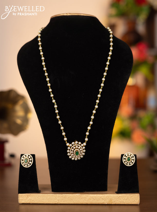 Pearl necklace with emerald and cz stones