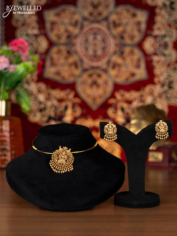 Antique ring type choker with lakshmi pendant and golden beads hangings