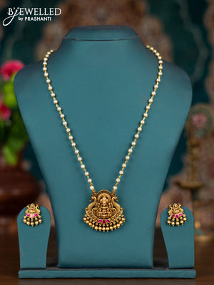 Pearl haram lakshmi pendant with pink jadau stones and golden beads hangings