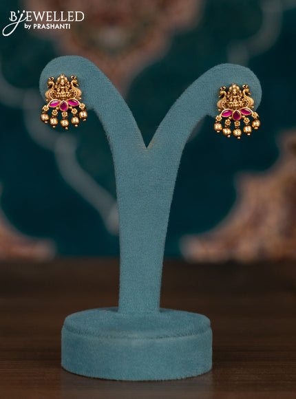 Pearl haram lakshmi pendant with pink jadau stones and golden beads hangings