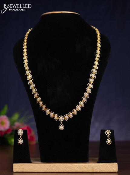 Zircon haram with cz stones in gold finish