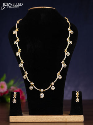 Zircon haram with cz stones in gold finish