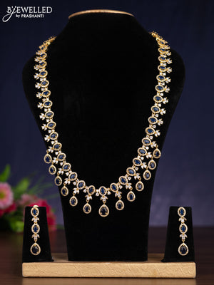 Zircon haram with sapphire and cz stones in gold finish