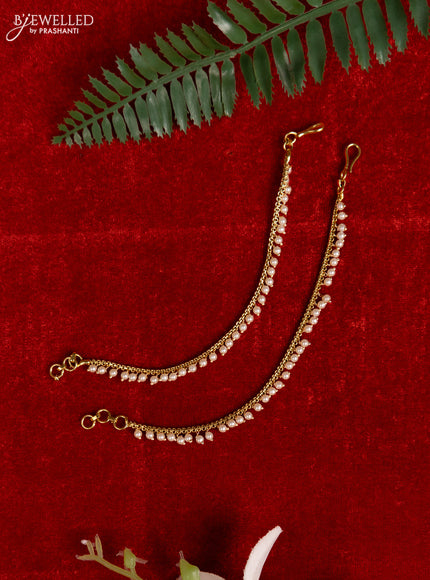Antique mattal with pearl hangings