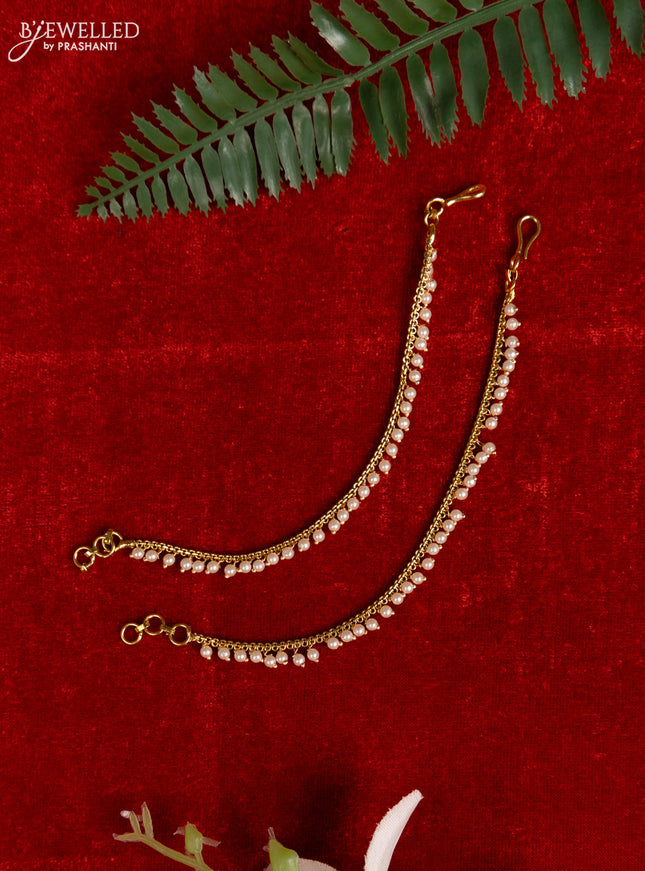 Antique mattal with pearl hangings