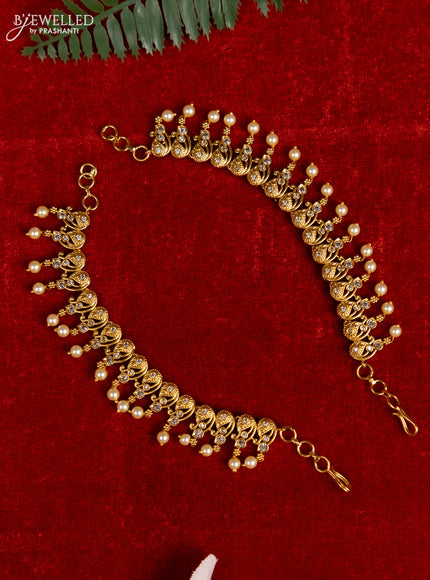 Antique mattal with cz stones and pearl hangings