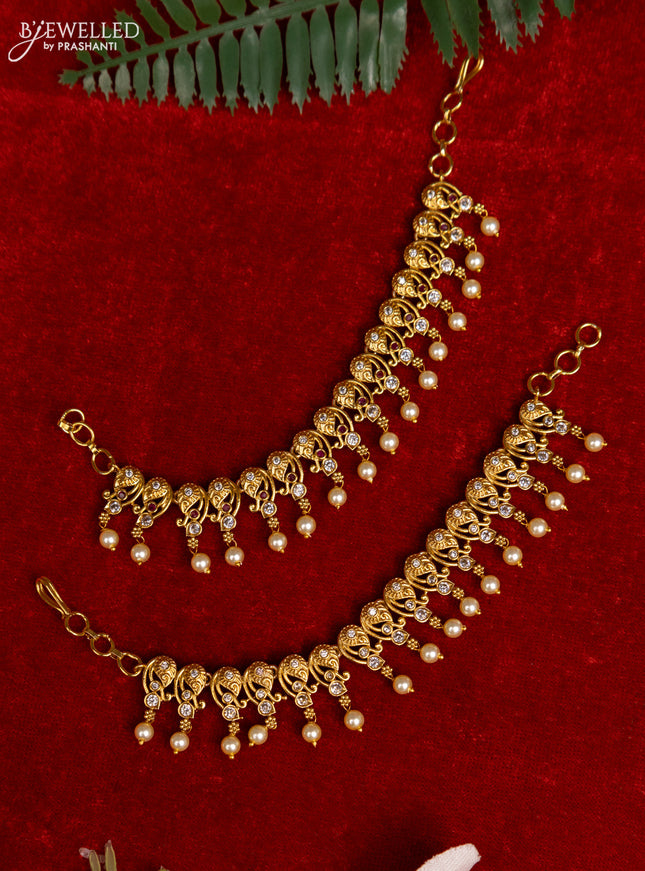Antique mattal with ruby & cz stones and pearl hangings