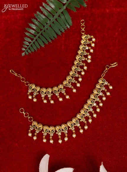 Antique mattal with emerald & cz stones and pearl hangings