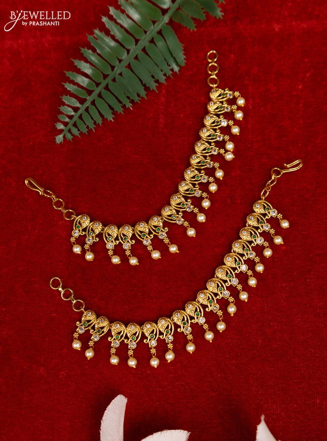 Antique mattal with emerald & cz stones and pearl hangings