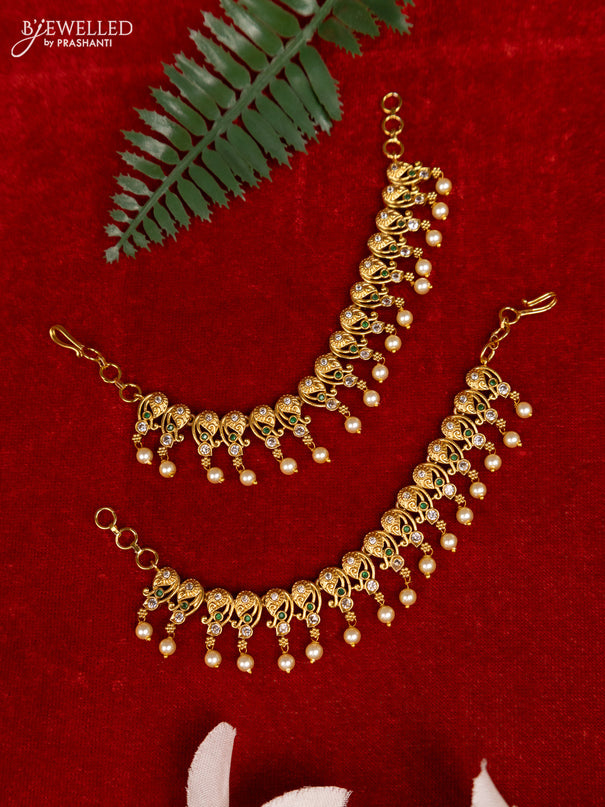 Antique mattal with emerald & cz stones and pearl hangings