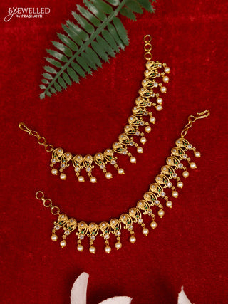 Antique mattal with emerald & cz stones and pearl hangings