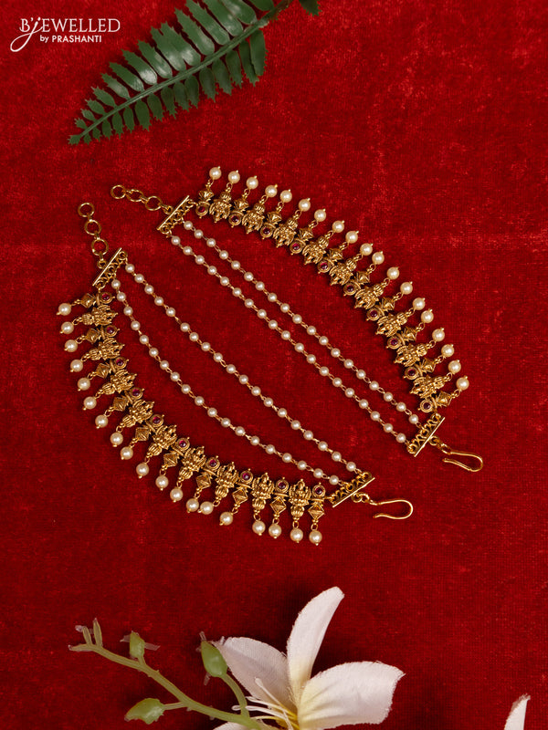 Antique triple layer mattal lakshmi design with ruby stones and pearl hangings