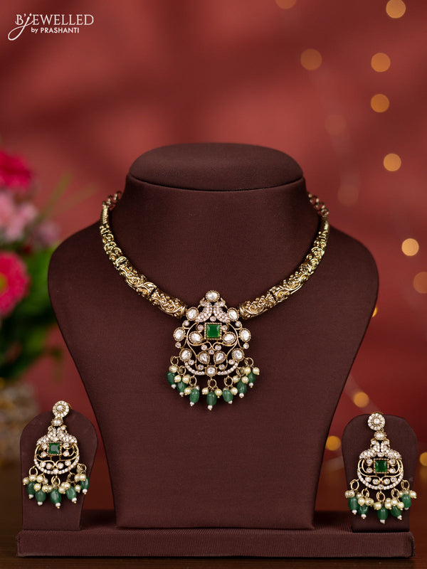 Necklace with emerald & kundan cz stones and green beads hangings in victorian finish