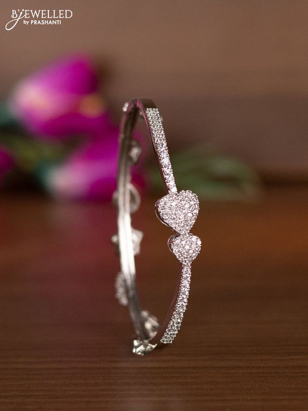 Bracelets heart shape design with cz stones and hangings in silver finish