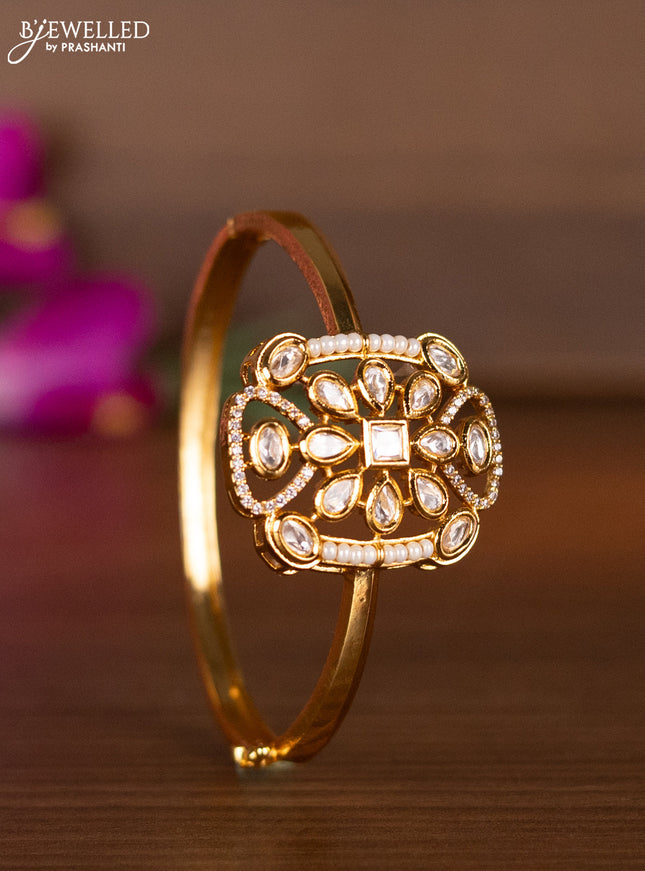 Bracelets with kundan & cz stones and pearls in gold finish