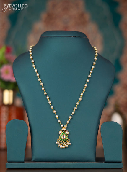 Pearl necklace with green jadau kundan stones
