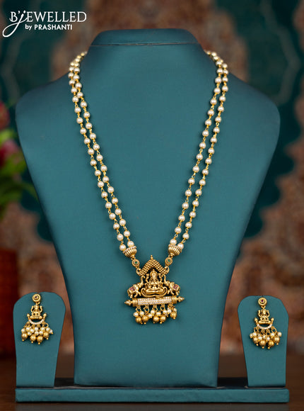Pearl double layer haram lakshmi pendant with kemp & cz stones and pearl & golden beads hangings