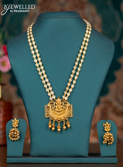 Pearl double layer haram ganesha pendant with kemp stones and golden beads hangings