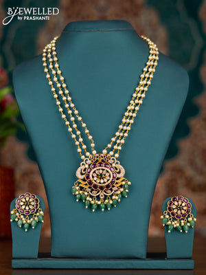 Pearl triple layer haram with kemp & cz stones and pearl & green beads hangings