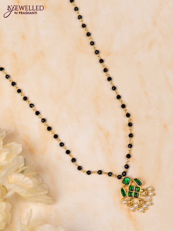 Mangalsutra with green jadau stones and pearl hangings without earrings