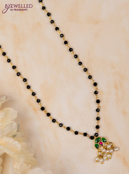 Mangalsutra with kemp jadau stones and pearl hangings without earrings