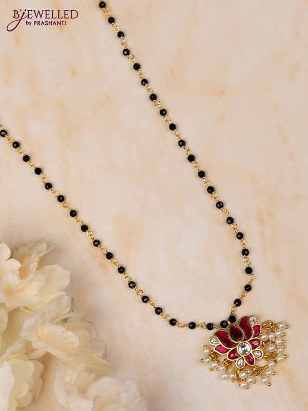 Mangalsutra lotus pendant with pink jadau kundan stones and pearl hangings without earrings