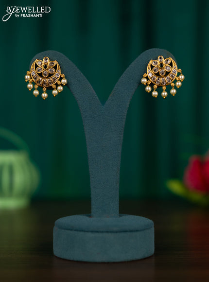Antique earrings chandbali design with emerald & cz stones and pearl hangings
