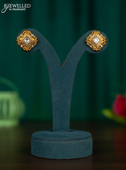 Antique earrings with kundan and cz stones